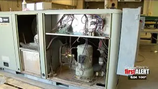A large, grey industrial HVAC system unit.
